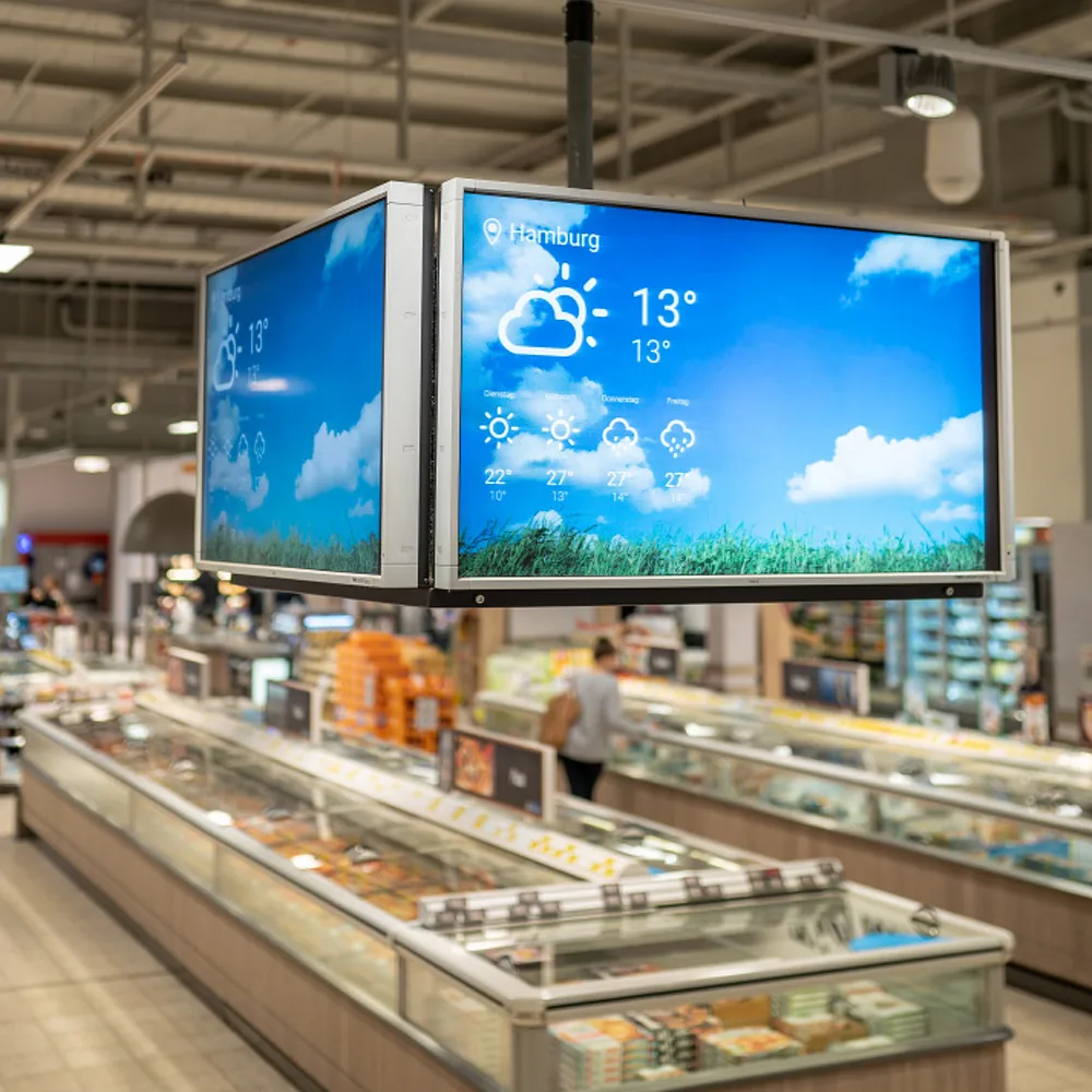 Edeka TV – Screens über den Kühltruhen am LEH-Point-of-Sale